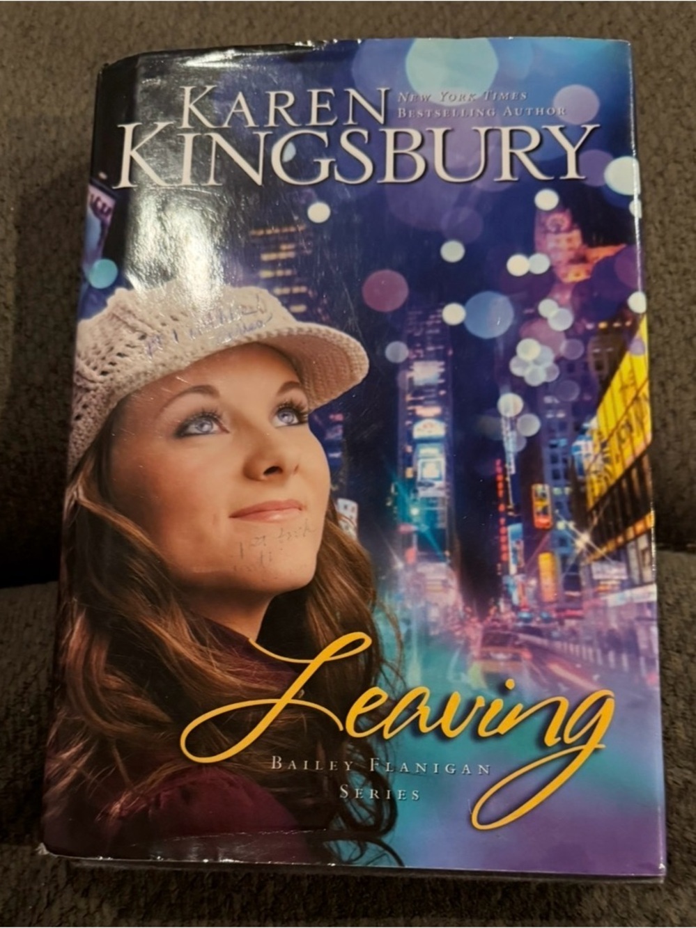 "Leaving" Paperback Novel - White Knit Hat Cover